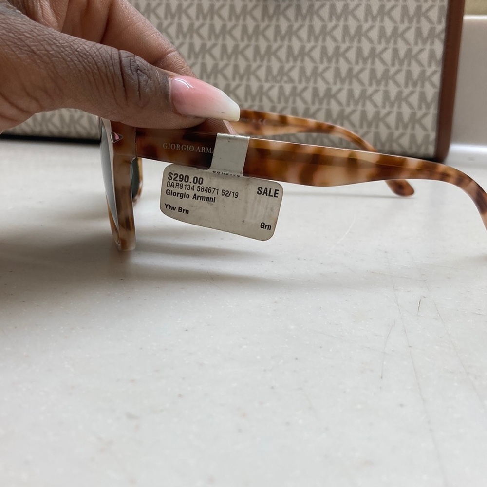 Brand new Georgia Armani sunglasses without case